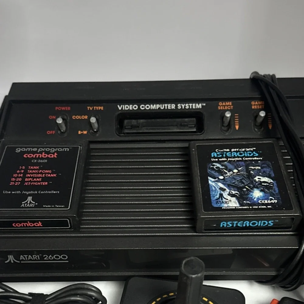 Atari 2600 Black Console RF w/ Joysticks, Paddle Controllers, Combat, Asteroids